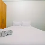 Simply Look Studio Tamansari Mahogany Karawang Apartment By Travelio