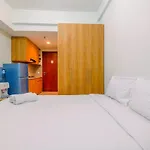 Simply Look Studio Tamansari Mahogany Karawang Apartment By Travelio