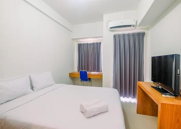 Simply Look Studio Tamansari Mahogany Karawang Apartment By Travelio