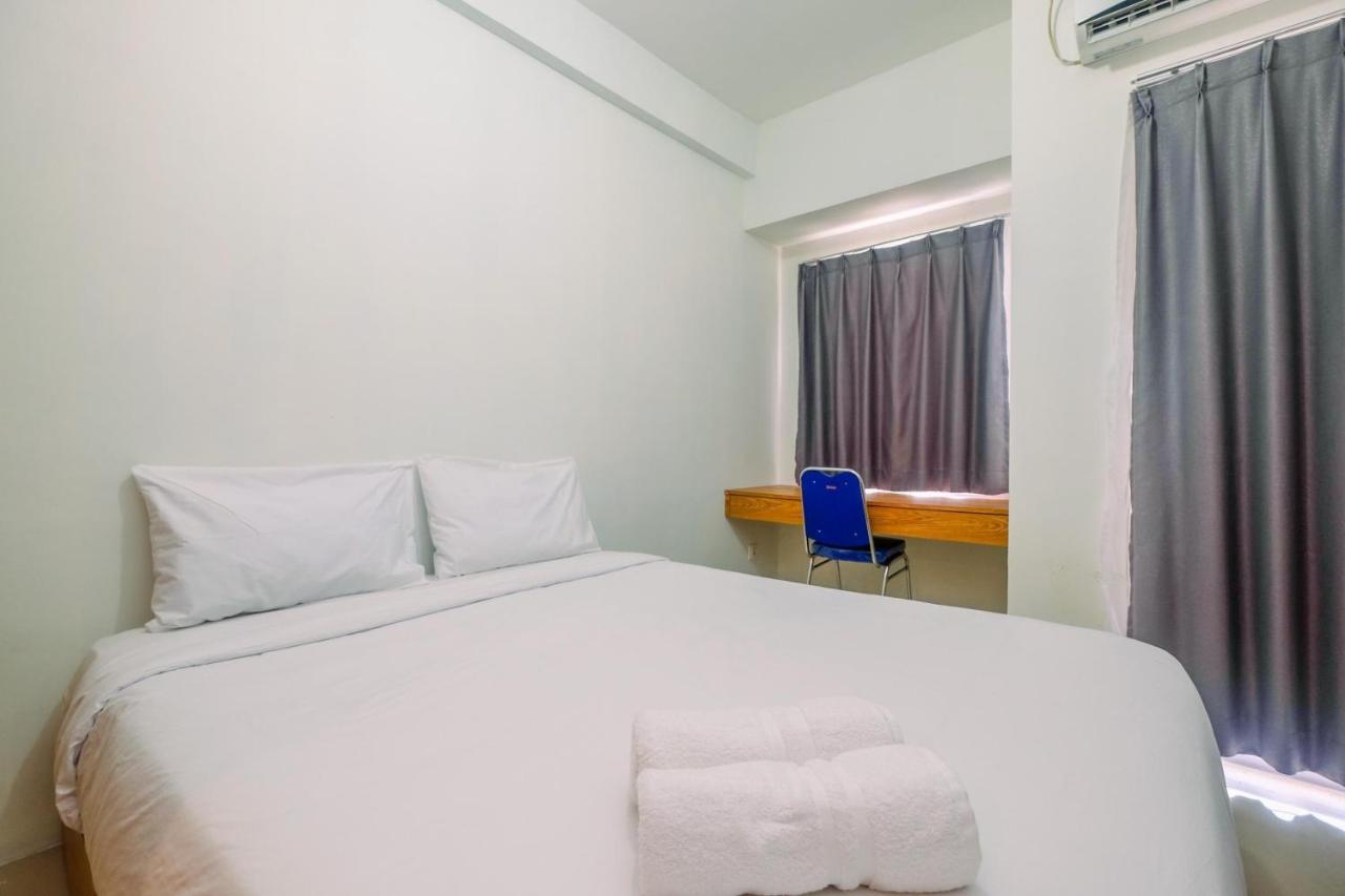 Apartemen Simply Look Tamansari Mahogany By Travelio *
